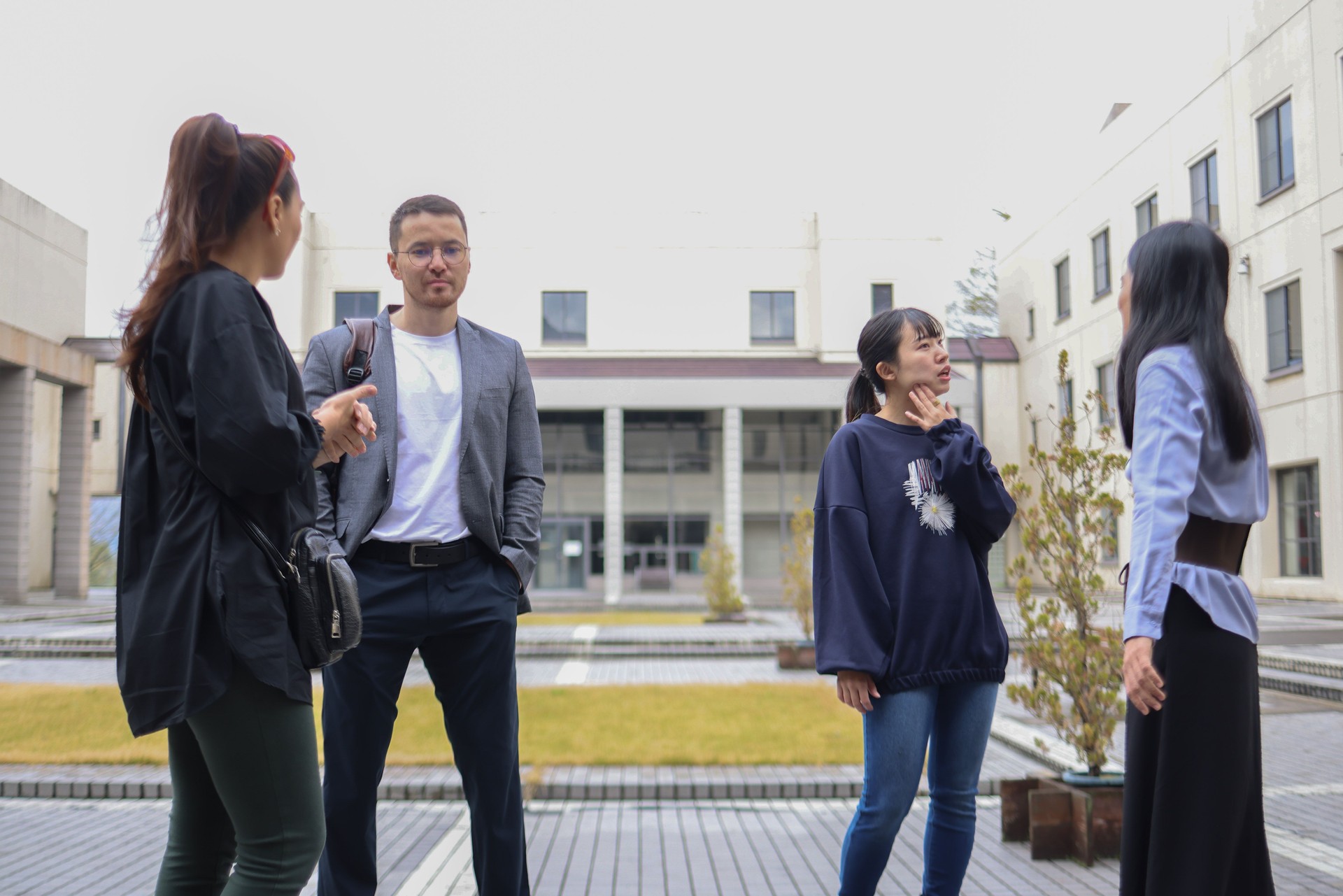 Graduate students enjoying talk at college campus